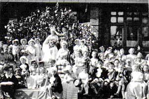 The Rose Queen entourage in the church courtyard