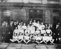 A young Joe seated third from the right with his fellow Bolton Harriers in 1900